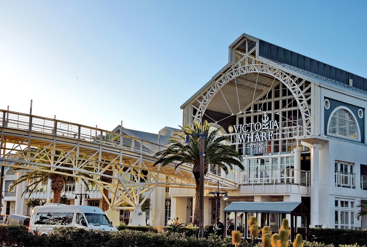 Exterior view of the iconic Victoria Wharf Shopping Center in Cape Town, South Africa.